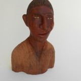 # 416 , First carving from this very old Chilean  "Alerce" wood. 15 inches tall , 10 inches wide  ,  SOLD